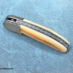Mammoth Ivory Damascus and Ruby Folder spine view