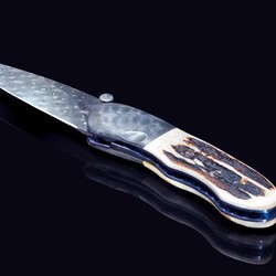 Sambar Stag and Raindrop Damascus Folding Knife side view