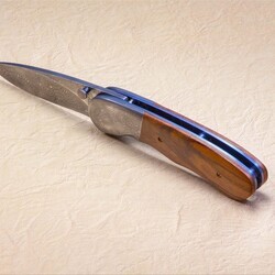 Stainless Damascus and Plum Wood Folding Knife side view