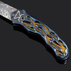 Thus Spoke Zarathustra Folding Knife with Ammonite Inlay close up