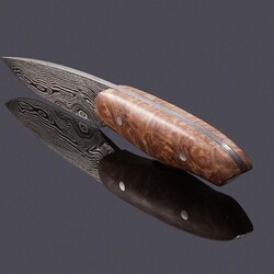 product/hunters/damascus-huntress-maple-burl-handle-and-fuchsia-perch-leather spine view