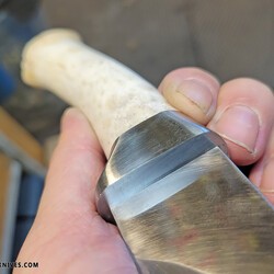 Oosic and Damascus Frontiers Blade guard fitting