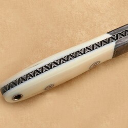 Walrus and Damascus Hunter Knife Engraved spine view