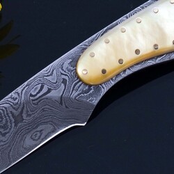 Gold Lip Pearl and Damascus Dress Knife Solid Gold Pins close up