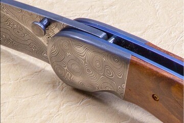 Stainless Damascus and Plum Wood Folder