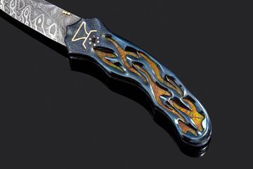 Thus Spoke Zarathustra Folding Knife with Ammonite Inlay close up