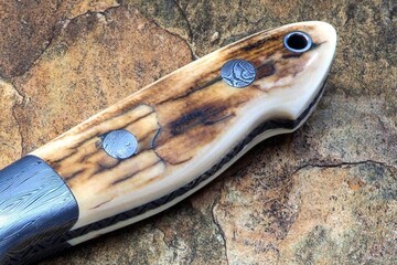 Crowsnest Damascus and Ivory Hunter close up