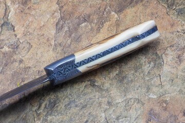 Crowsnest Damascus and Ivory Hunter file work