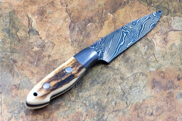 Crowsnest Damascus and Ivory Hunter other side