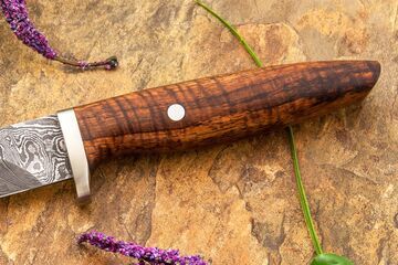 Random Damascus and Curly Koa Hunter close up