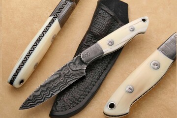 Walrus and Damascus Hunter Knife Engraved main view