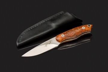 Brown Birdseye Maple Utility in CPM S35-VN with leather sheath