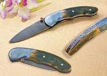 Stainless Damascus and Ruby Folder