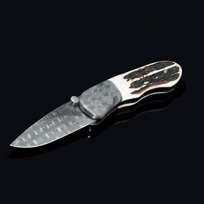 Sambar Stag and Raindrop Damascus Folding Knife 