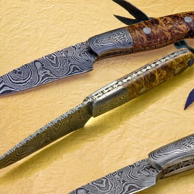 Damascus Cascades Hunter with Stabilized Maple Handle