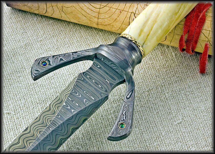 Hyperborian Damascus Dagger with Narwahl Tusk Damascu guard close up