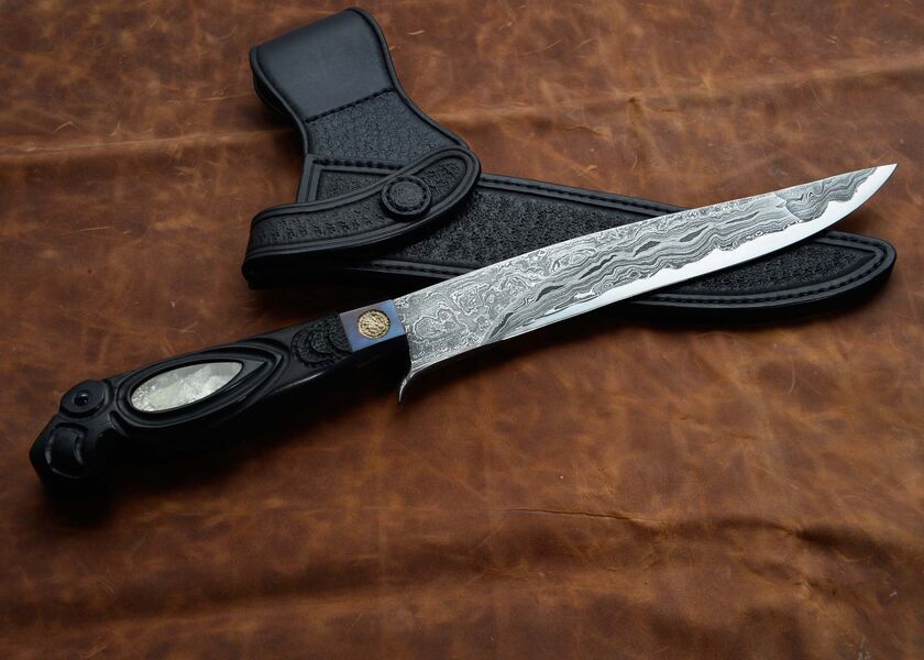 Skraeling Biter Damascus Fighter with carved raven sheath