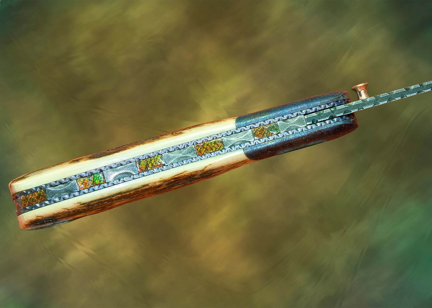 Campo de Cielo Meteorite and O1 Damascus Folder spine view with Ammonite Inlay