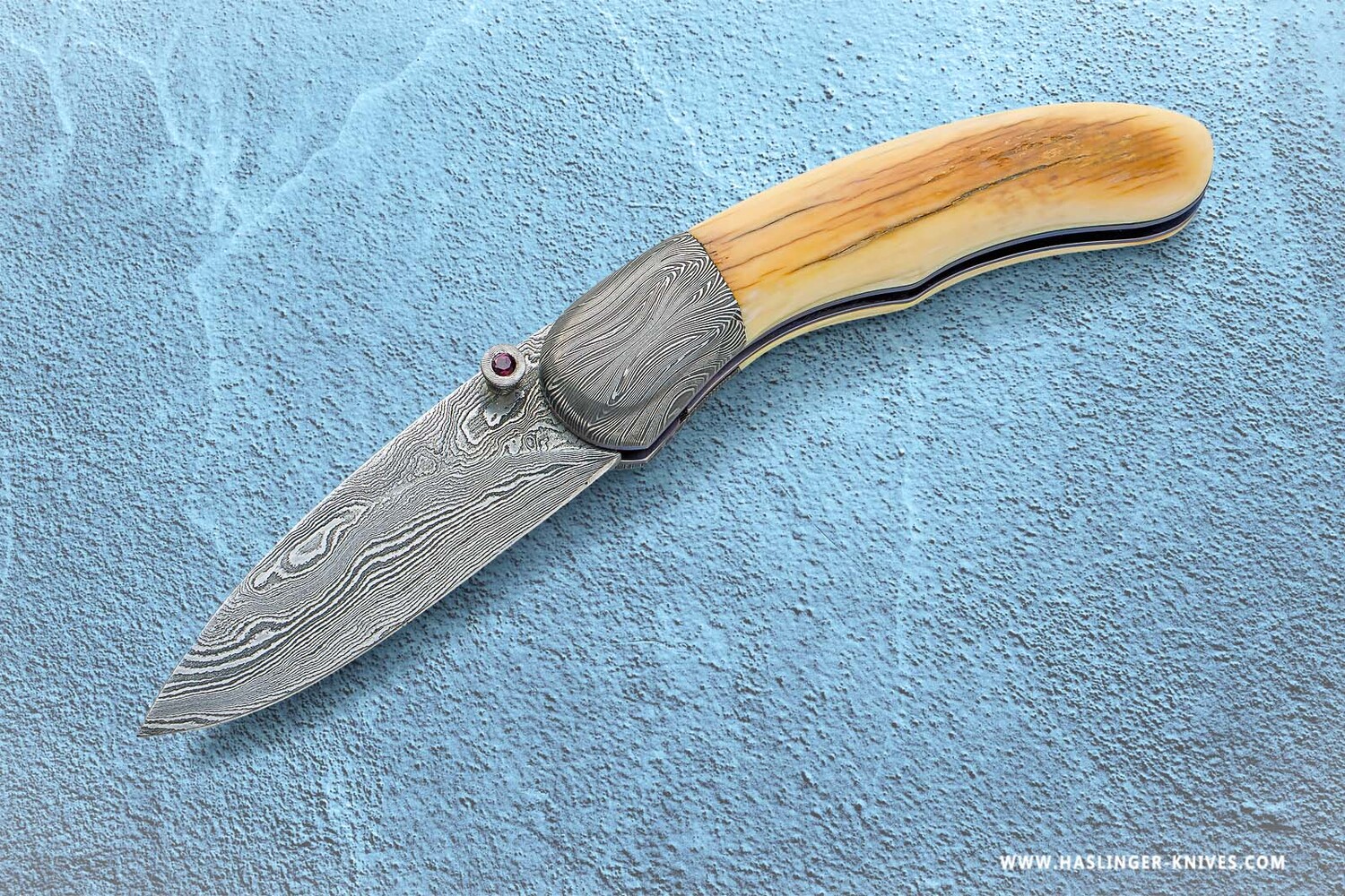 Mammoth Ivory Damascus and Ruby Folder main view