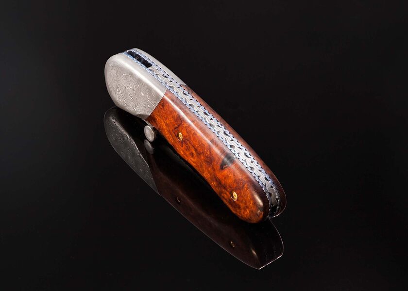 Raindrop Damascus and Ironwood Burl Folder spine view