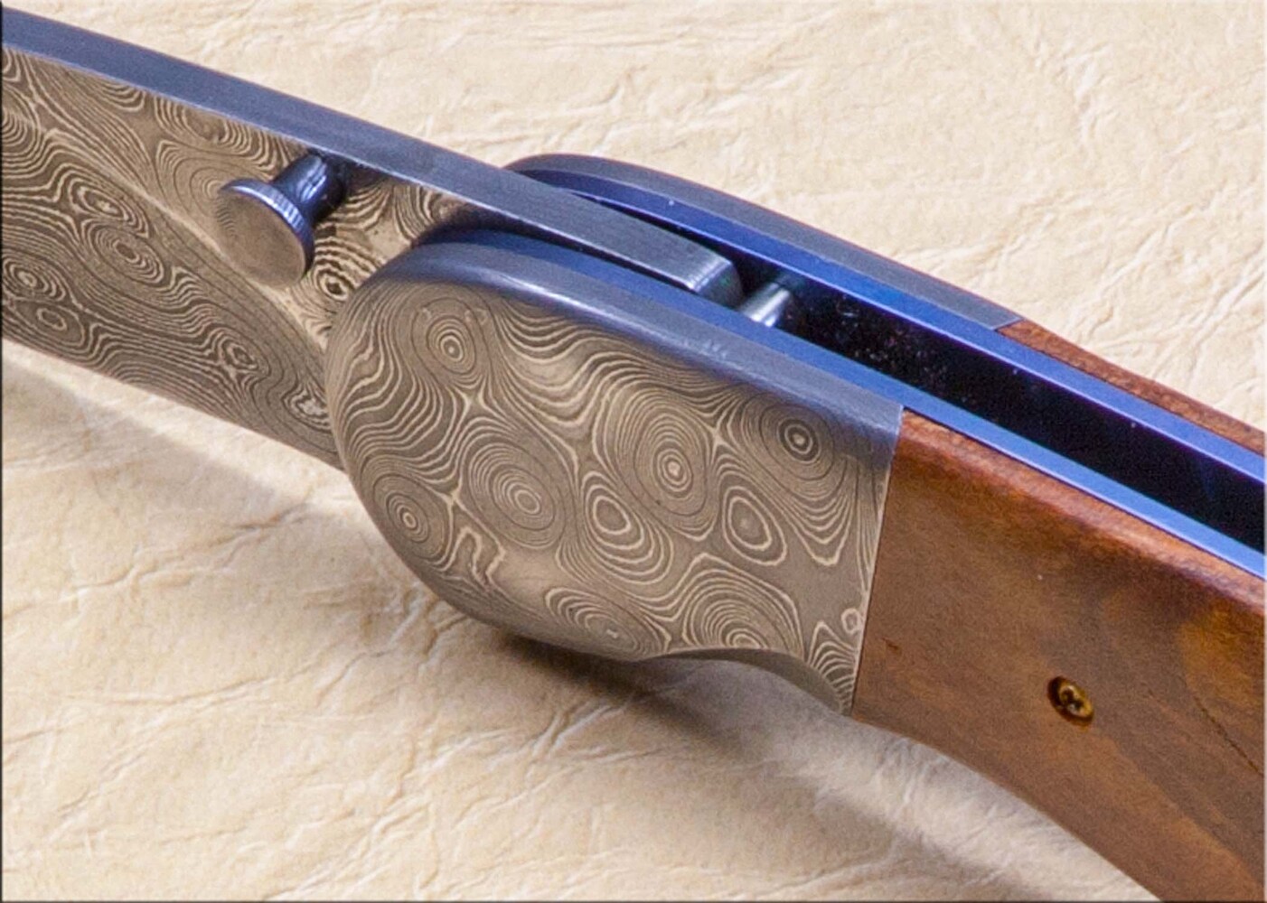 Stainless Damascus and Plum Wood Folder