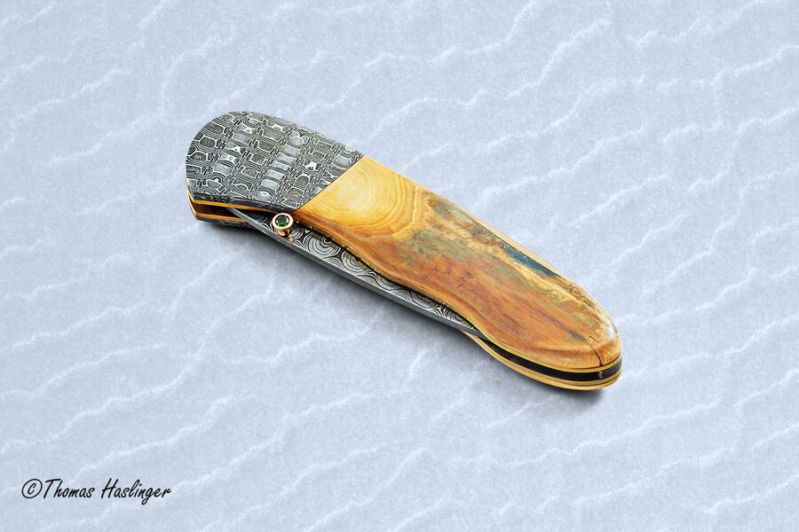 Stainless Mosaic Damascus Folder with Mammoth Ivory Gold and Peridot closed view