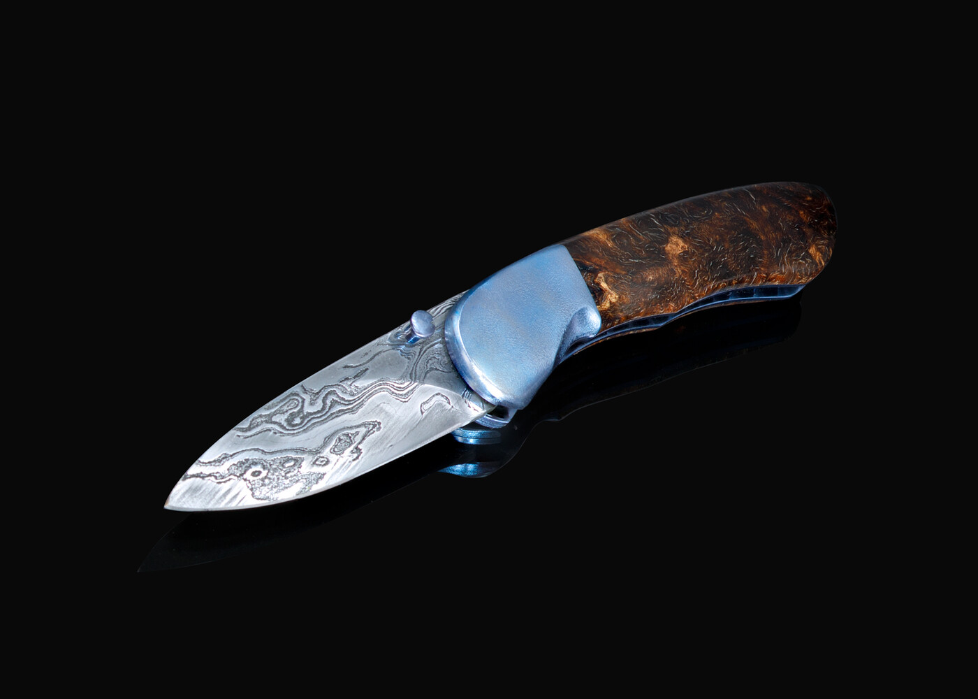 Textured titanium spalted maple and Damascus folder main view