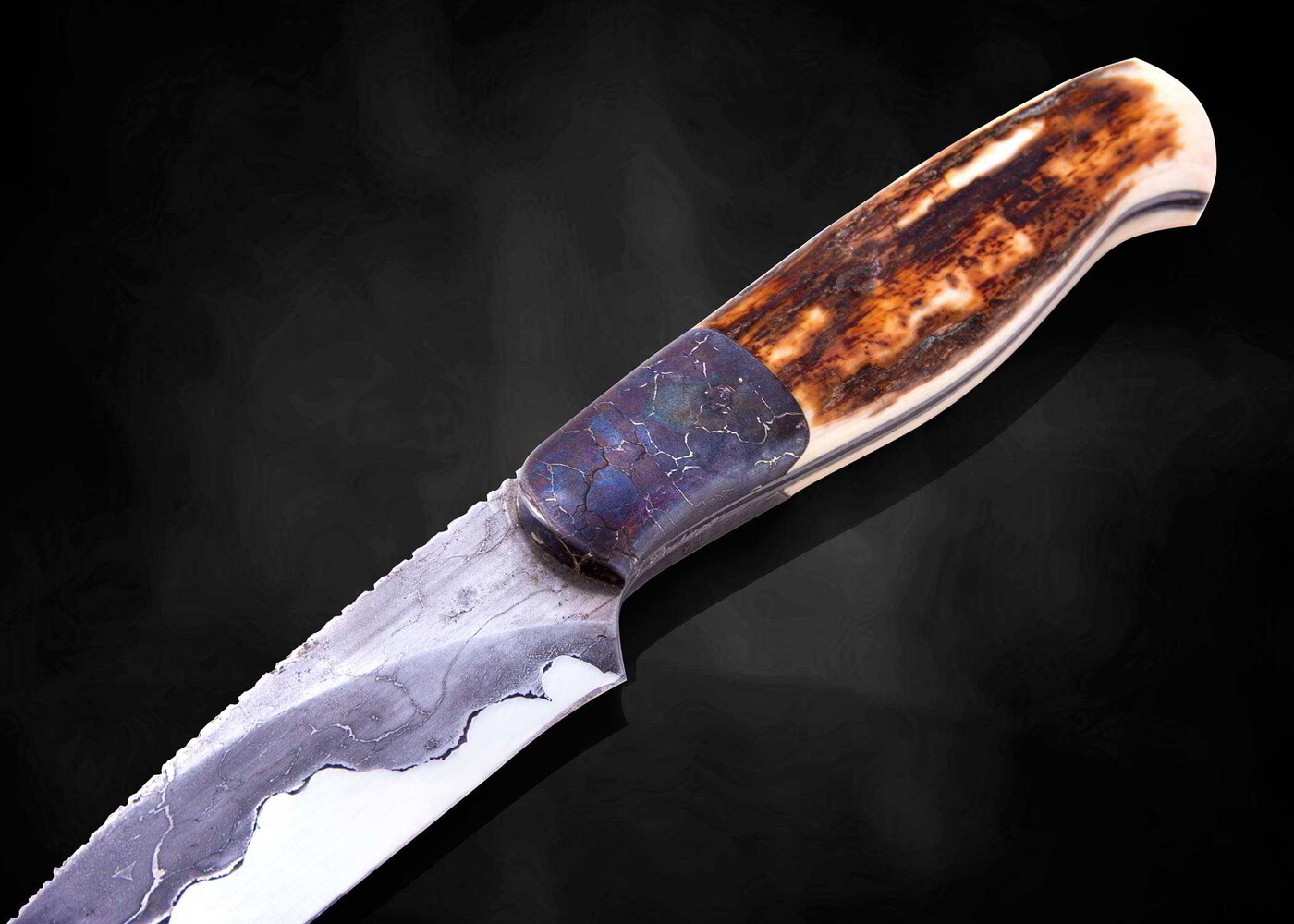 Campo de Cielo Meteorite and O1 Damascus Hunting Knife close up