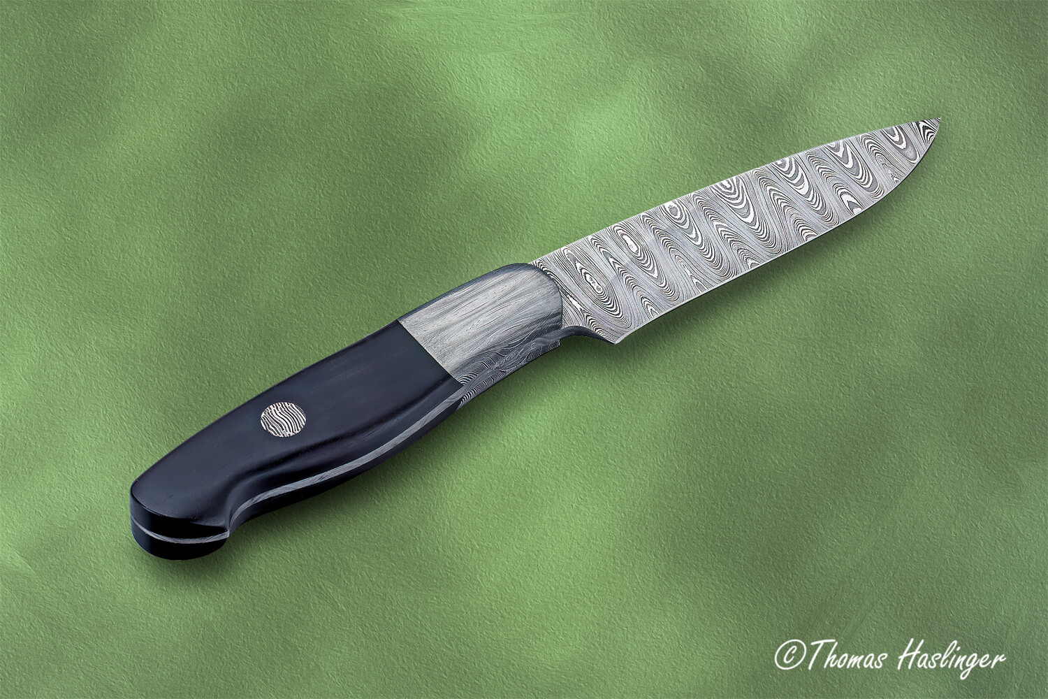 Cape Breton Hunter in Ladder Damascus and Ebony Handle other view