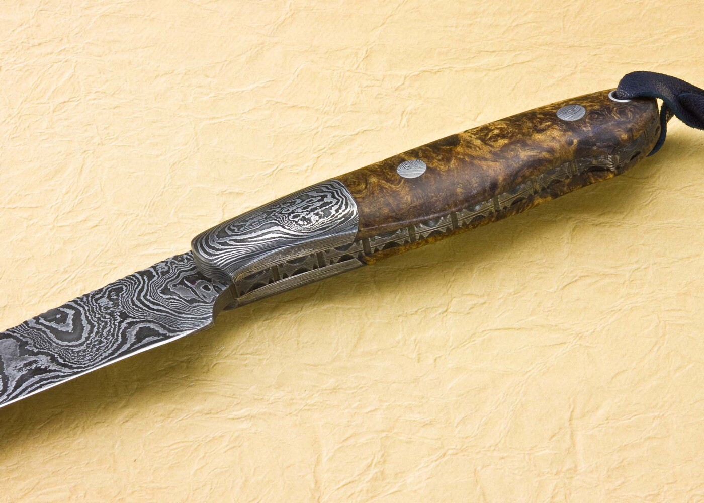 Damascus Cascades Hunter with Stabilized Maple Handle side view