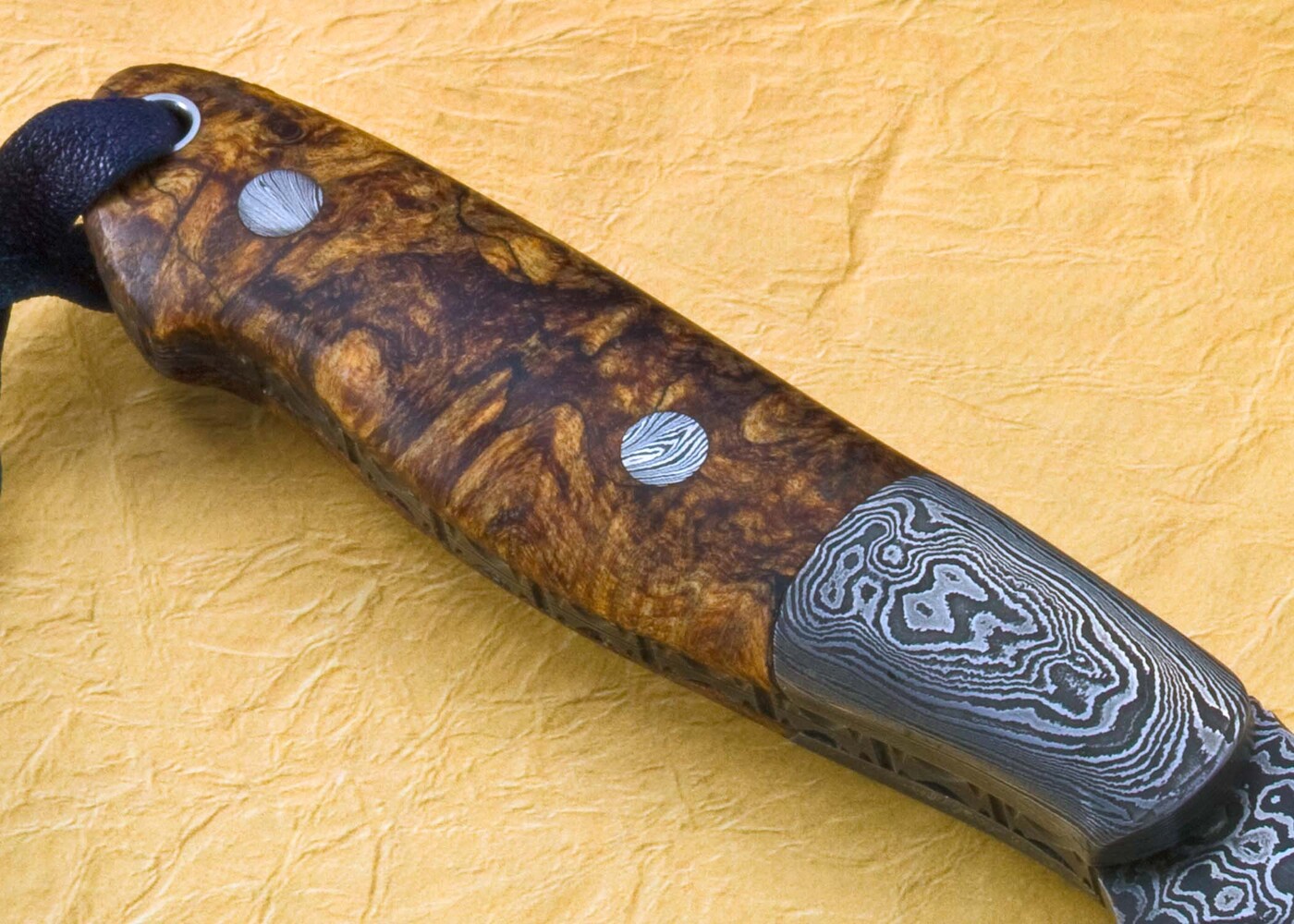 Damascus Cascades Hunter with Stabilized Maple Handle handle view