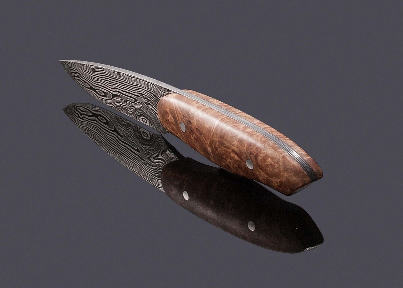 product/hunters/damascus-huntress-maple-burl-handle-and-fuchsia-perch-leather spine view