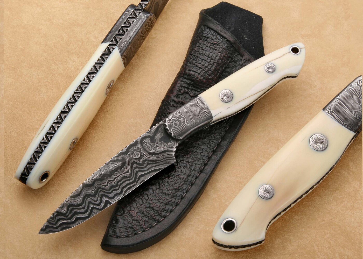 Walrus and Damascus Hunter Knife Engraved main view