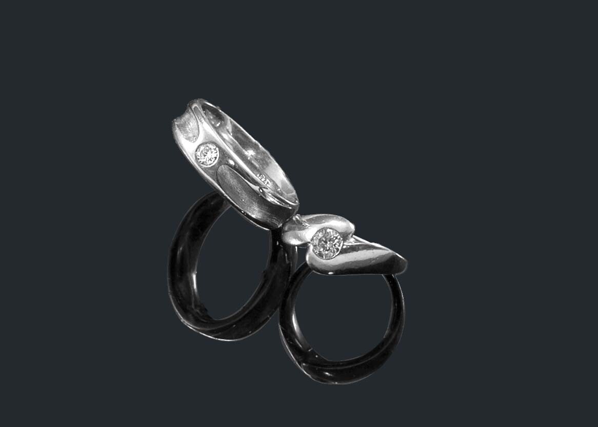 His and Hers Platinum wedding bands with princess cut diamonds