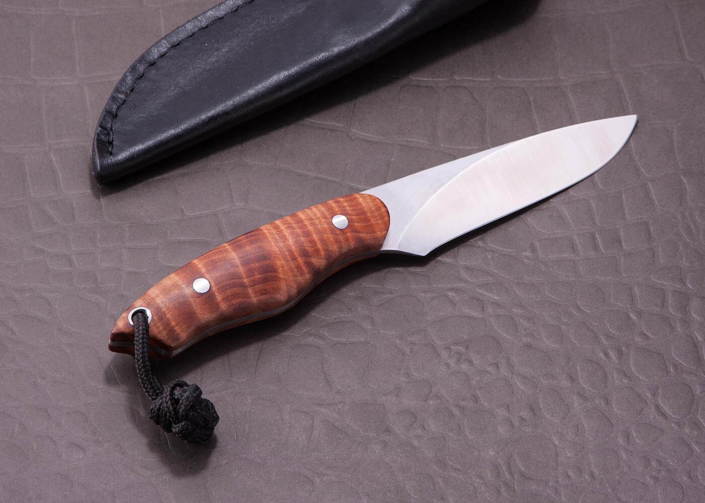 Fiddleback Maple Huntress in CPM S35-VN Stainless side view